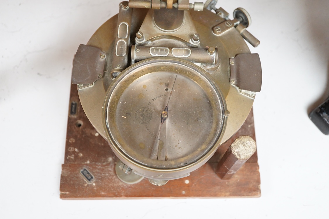 A late 19th century German brass theodolite by Hildebrand, Freiberg, serial number engraved to the centre of the compass, no. 53438, 32cm high